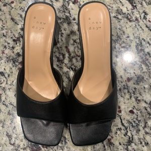 7.5 Black Mule Shoes. Never worn. Great Condition.